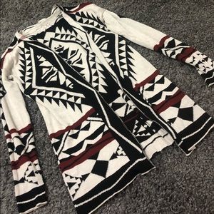 Red, Black, and Cream colored Cardigan